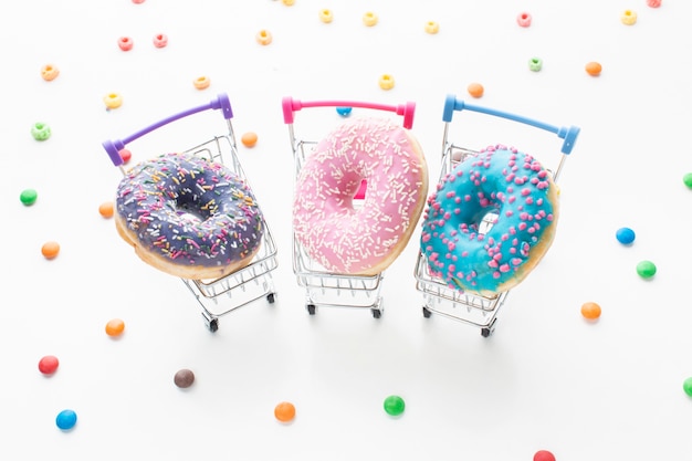 Free photo donuts in carts front view