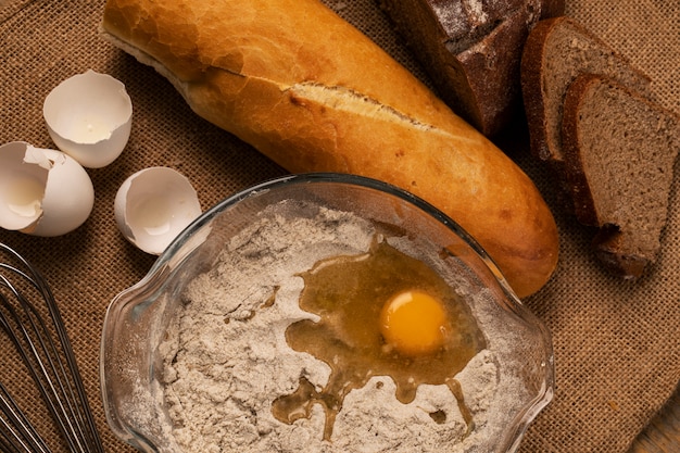 Dough making and rye bread with baguette. Top view.