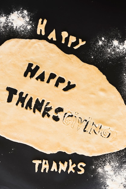 Free Photo dough with thanksgiving inscription and between flour