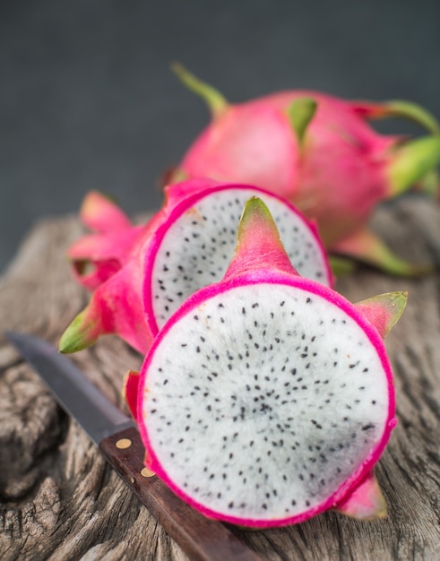 Free photo dragon fruit on a wooden board