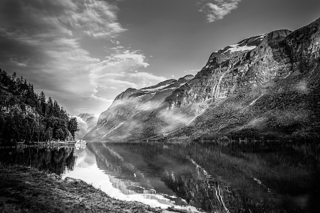 Free photo dramatic black and white landscape with lake