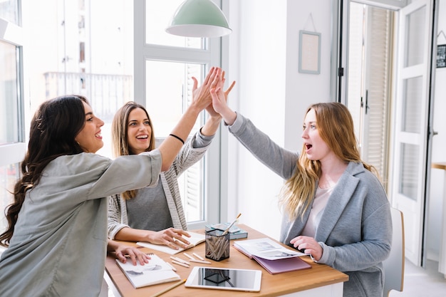 Free photo drawing women giving high five