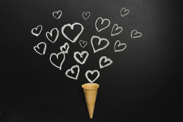 Free photo drawn hearts and waffle cone