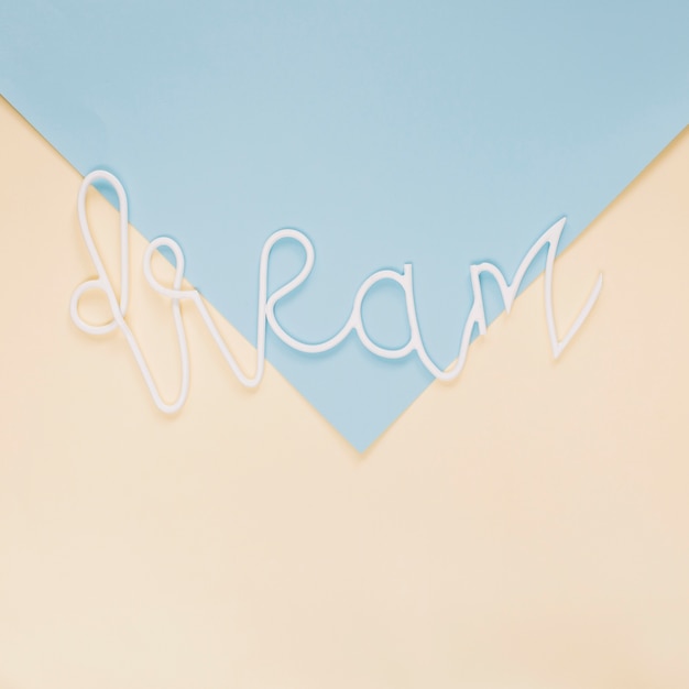 Dream word on colorful paper background