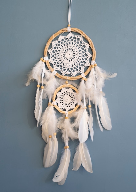 Free Photo dreamcatcher hanging on a wall