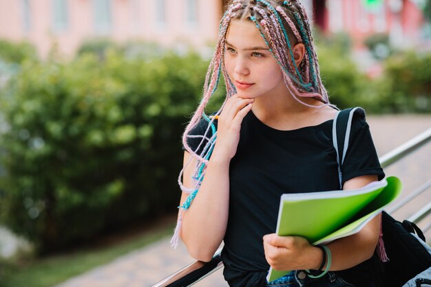 Dreamy student with braids