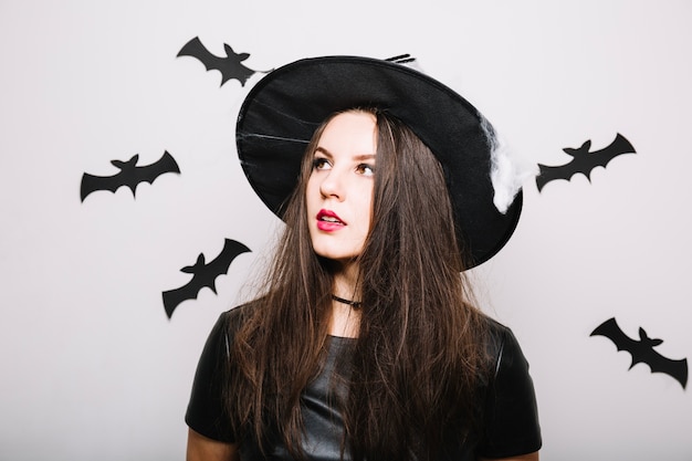 Free Photo dreamy witch girl in bats