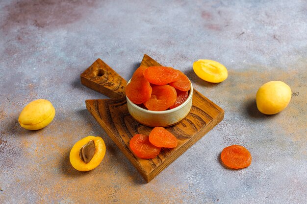 Dried apricots with fresh juicy apricot fruits,top view