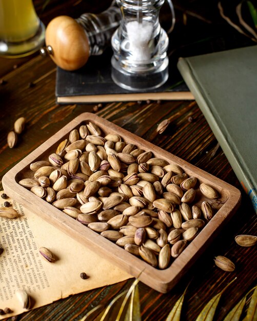 Dried pistachio in bamboo serving