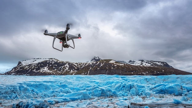 Free Photo drone with a camera is flying on iceberg.