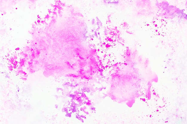 Drops of magenta watercolor