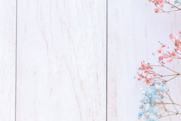 Free photo dry flowers on wooden surface, selective focus, spring mood