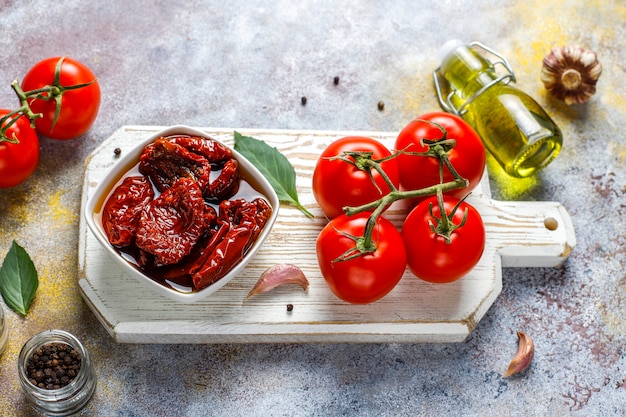 Dry tomatoes with olive oil.