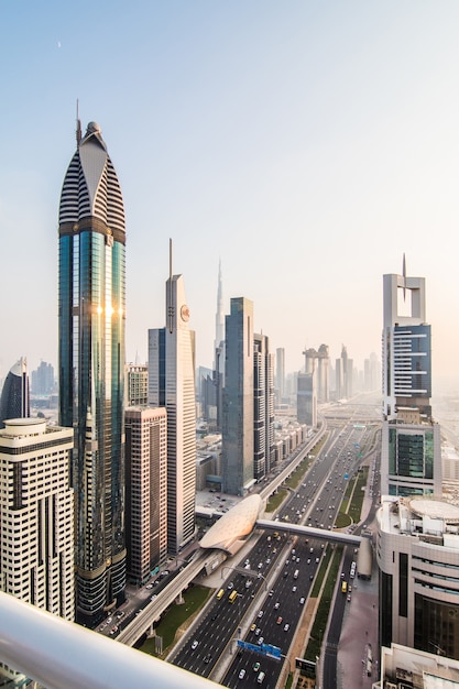 Free photo dubai skyline in sunset time, united arab emirates