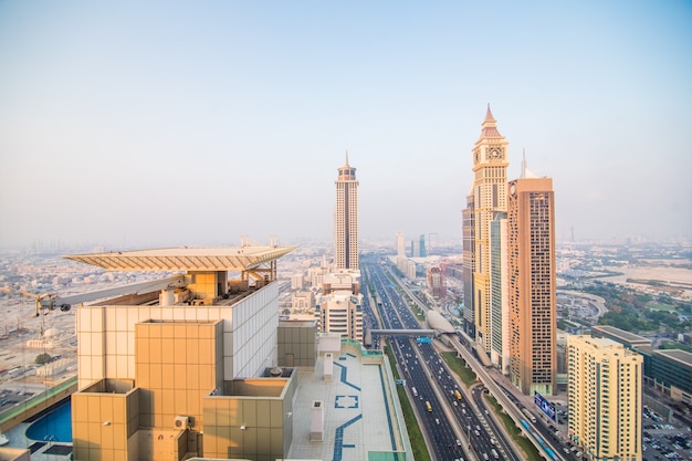 Free photo dubai skyline in sunset time, united arab emirates