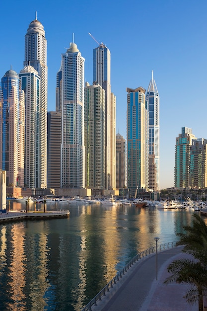 DUBAI, UNITED ARAB EMIRATES - NOVEMBER 11: view of Dubai Marina Towers in Dubai, United Arab Emirates on November 11,2014. Dubai Marina is a district in Dubai and an artificial canal city.