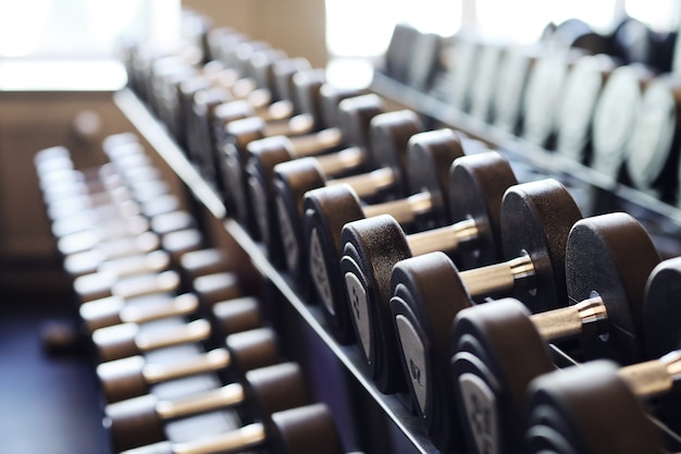 Dumbbells in gym