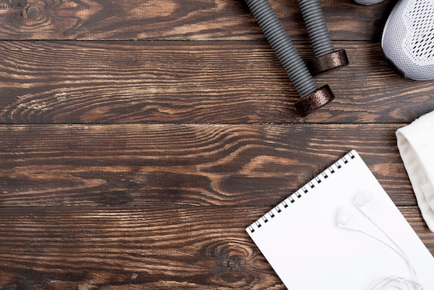 Dumbbells on wooden background