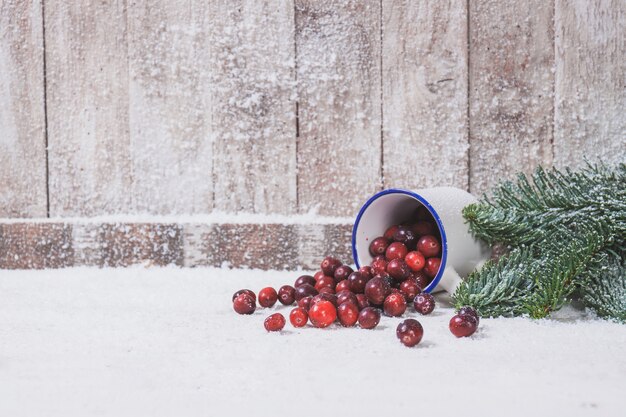 Dump cup with cherries inside and ornaments