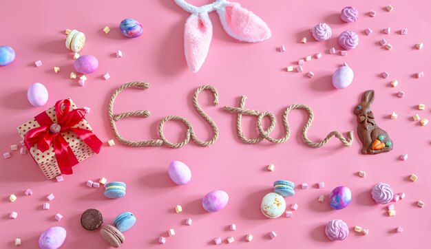 Easter creative inscription on a pink background .