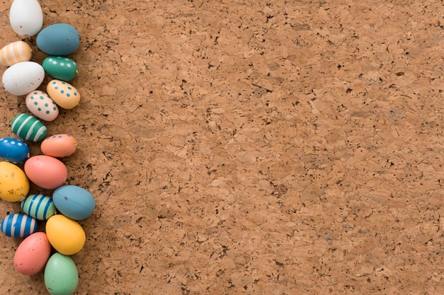 Easter eggs on cork background