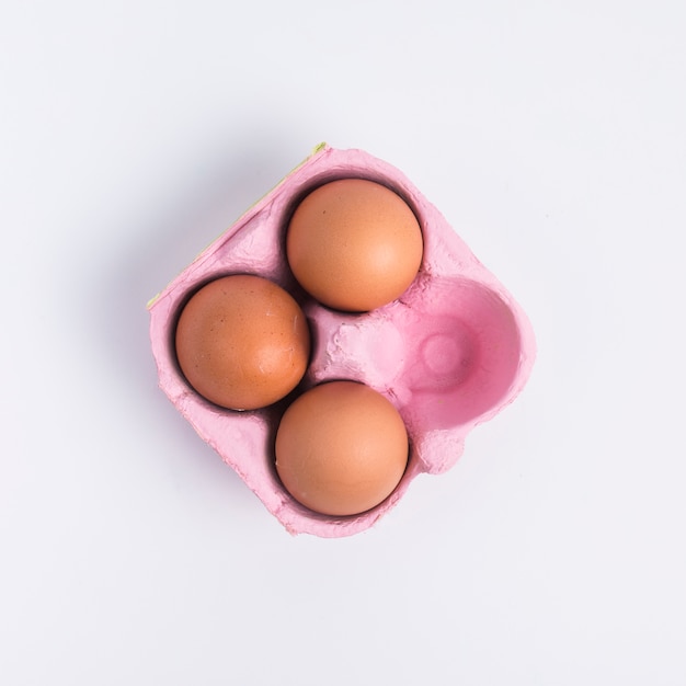 Easter eggs in pink container