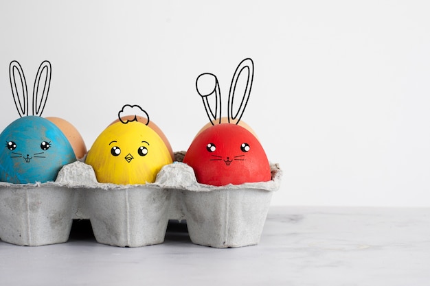 Easter eggs with painted funny faces