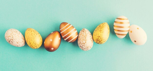 Easter Flat Lay of Eggs on turquoise