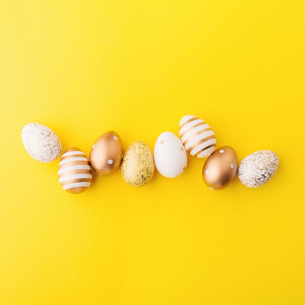 Easter Flat Lay of Eggs on yellow