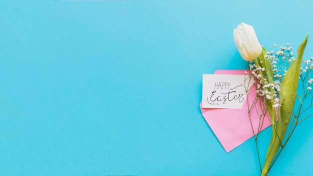 Easter greeting and white flower