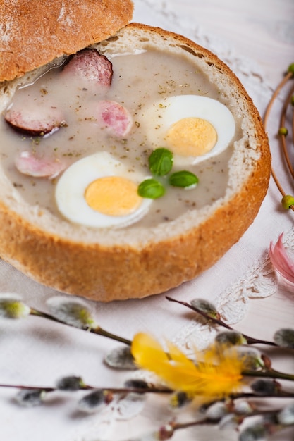 Free Photo easter white borscht in bread bowl