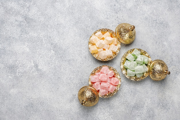 Free photo eastern sweets. turkish delight, lokum with nuts, top view.