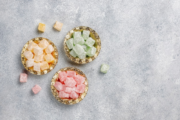 Free photo eastern sweets. turkish delight, lokum with nuts, top view.