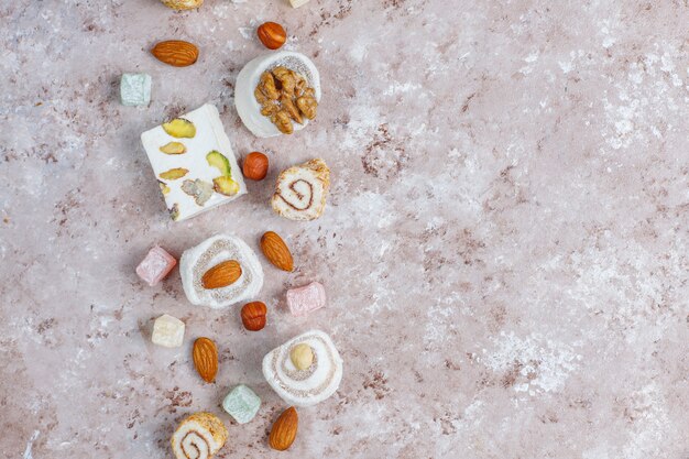 Eastern sweets.Turkish delight, lokum with nuts, top view.