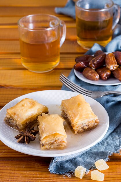 Eastern sweets with dates fruit and tea