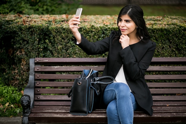 Eastern woman with phone