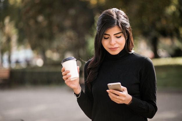 Eastern woman with phone