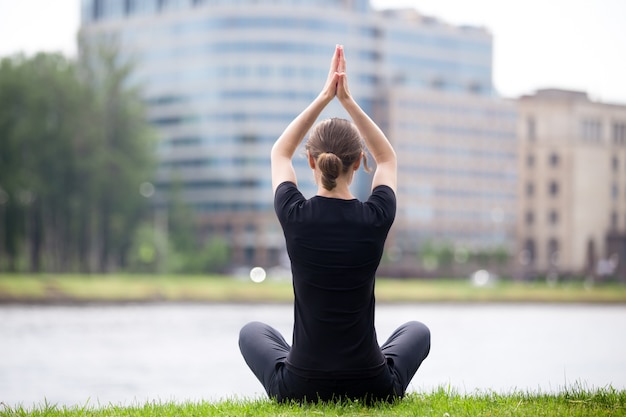 Free photo easy yoga pose on the street