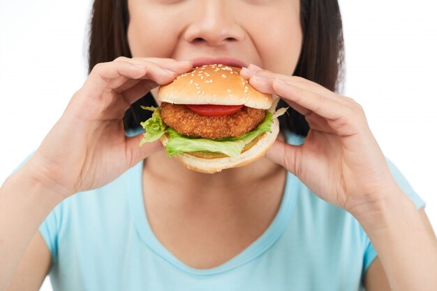 Eating Delicious Hamburger