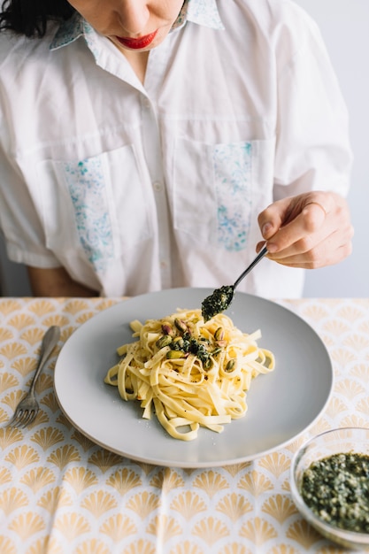 Free photo eating pasta