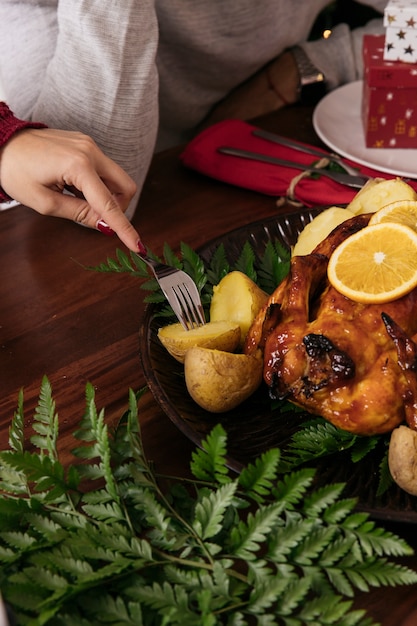 Free photo eating potato at christmas dinner