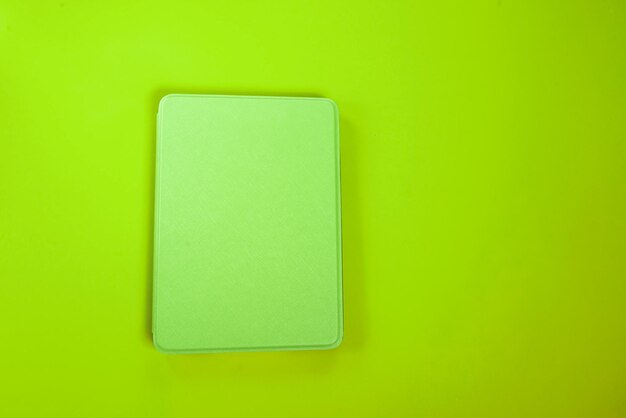 Ebook reader over yellow background