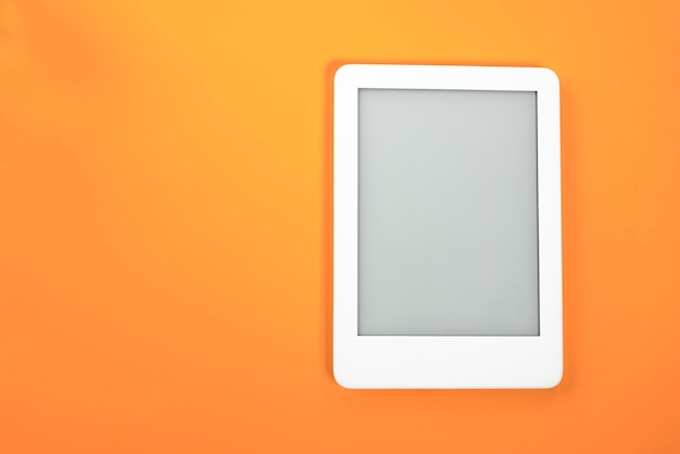 Free photo ebook reader over yellow background