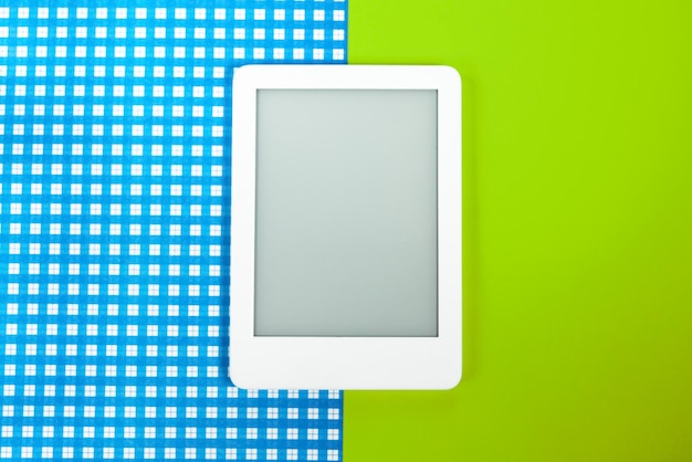 Free Photo ebook reader over yellow and blue background