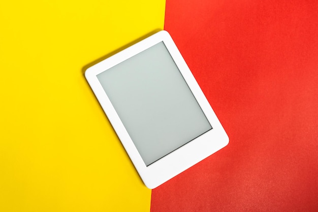 Free photo ebook reader over yellow and red background