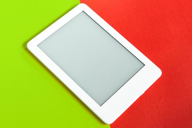 Ebook reader over yellow and red background