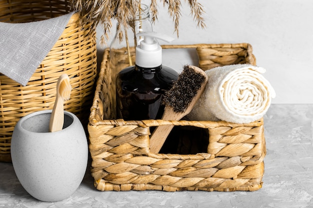 Free Photo eco-friendly cleaning products set in basket with brushes and toothbrush