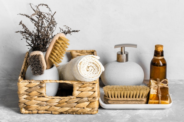 Free Photo eco-friendly cleaning products set in basket with soaps and brushes