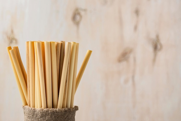 Eco-friendly environment bamboo tube straws copy space