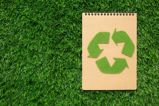 Ecological notebook with recycle sign